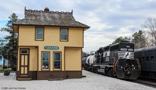 After leaving the trailing unit and north bound boxcars on the Beesley's Point Secondary, the lead unit shoves the interchange cars, past the Tuckahoe Station, and down the Cape May Seashore Lines Branch.