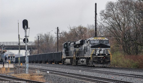 The power for what will be train #: 39G Camden-Pittsburgh, waits to double up its cars, in Camden Yard.