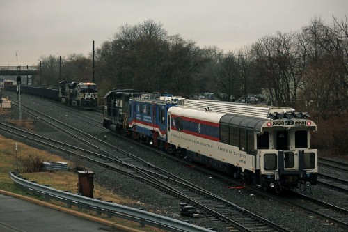 901 meets NS mixed freight 39G building its train for Conway