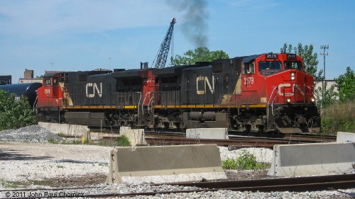 After the morning rush, for the Metra trains, was over, it was time for a CN mixed freight train to cross over the complex system of diamonds, at 16th Street, in Chicago, IL.