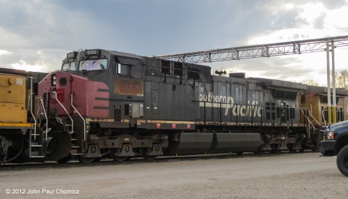 Union Pacific #: 6153 is an ex-Southern Pacific AC4400 unit that still had its original Southern Pacific paint scheme, as of when this photo was taken. It was seen sitting in the Union Pacific Yard in Council Bluffs, Iowa.