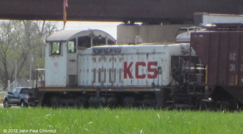 Forgive the poor quality of the picture but its not often that I see a Kansas City Southern switcher, so I took this photo of KCS #: 4223 (NW2) sitting in the Union Pacific North Yard, in Council Bluffs, Iowa. It was pretty far away and I didn't want to trespass, so I had to zoom and crop, significantly.