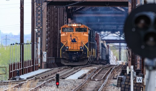 The extremely dirty, and graffitied, CNJ heritage unit leads train 39G over the Delair Bridge, in Pennsauken, NJ.