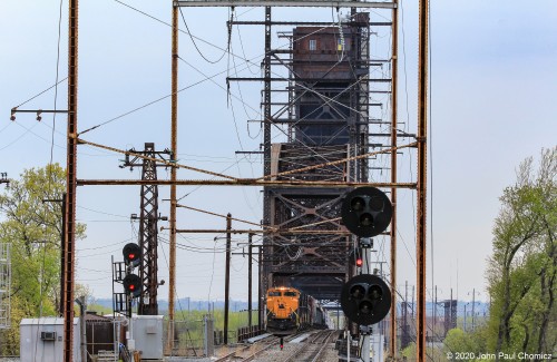 Train 39G is dwarfed by the Delair Bridge, as it rolls off the bridge onto the Jersey Side.