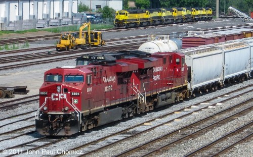 In 2011, Binghamton Yard was still owned by Canadian Pacific Railroad. Here, a CP train prepares to depart west, out of the yard. Behind it is a line of NYS&W locomotives.