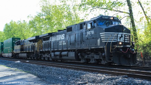 Besides having a leading unit with one burnt out headlight, NS 20K had the Nickel Plate unit trailing.