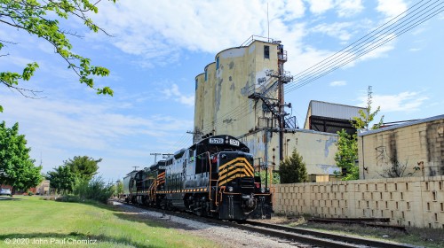 W&W #: J101 sits near the defunct Millville Glassworks before shoving a lone hopper back into the yard.