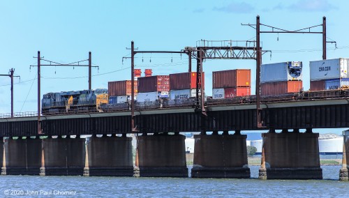 Although this location is ideal for eastbound departures, one can get interesting shots of westbounds, as well. Here, a CSX intermodal train crosses the Upper Bay Draw, in Bayonne, NJ, as it heads towards Port Newark.