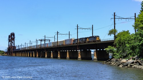 After picking up the rest of its train, CSX Oak Island to Selkirk train #: Q434 heads across the Upper Bay Bridge on the start of its journey east. As I am used to the majority of train departures, from Oak Island, as being odd numbered westbounds, this one is actually railroad eastbound to Selkirk.