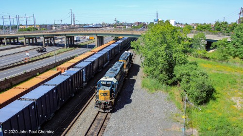 After coming across the Arthur Kill Drawbridge, with the trash loads, the CSX units head south on the Chemical Coa…..Er, "Garden State Secondary", to switch cars in Bayway Yard, in Linden, NJ.