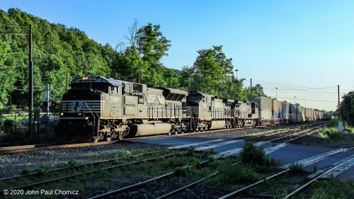 This late afternoon, eastbound intermodal train rolls alongside Riverside Drive, in Bethlehem, PA.