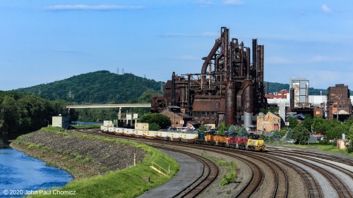 A colorful lashup of Lehigh Valley Rail Management (ex-PB&NE) units pass "The Stacks" (ex-Bethlehem Steel Furnaces) with double stacks for newly established NS train #: 21V.