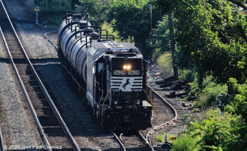 After the passing of the RVL westbound, the Conrail Irvington Branch Local, out of Oak Island appears. It is waiting for permission to re-enter the Lehigh Line to return to Oak Island.