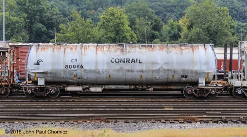 While passing by Allentown Yard, one day, I was lucky enough to catch three ex-Conrail scale cars, in a row, sitting in the yard.