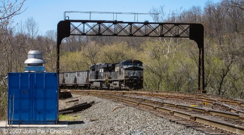 Another view of the loaded, "Top Gon", train. This time, it is framed underneath the ex-PRR signal bridge in Mingo Junction, Ohio.