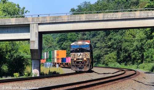 Looking east, at the same location, allows a better lit photo of this westbound intermodal passing under Route 333, in Thompsontown, PA.