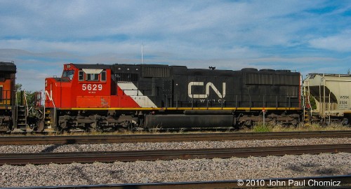 Canadian National SD75I #: 5629 is the trailing unit on this massive mixed freight near downtown Dallas.