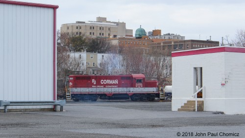 When I go to Allentown, it's usually for NS. On this particular day, my friend and I heard a horn, coming from across the Lehigh River, near downtown. When we went to investigate, we found that it was the Roger J. Corman Railroad GP16 #: 1713, at work. Here, I got my first glimpse of it as it rolled out in between the buildings, and I was very surprised and happy to see it. It was the first time I've ever seen that railroad, at work, while in Allentown, PA.  Usually, when I'm there, it is nowhere to be found.