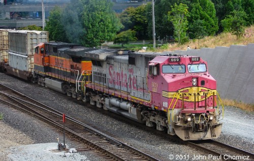 In a show of how common a sight the original Warbonnets are, BNSF #: 669 leads what appears to be a double-stack train of intermodal containers but are actually garbage/sludge containers, through Seattle, WA.