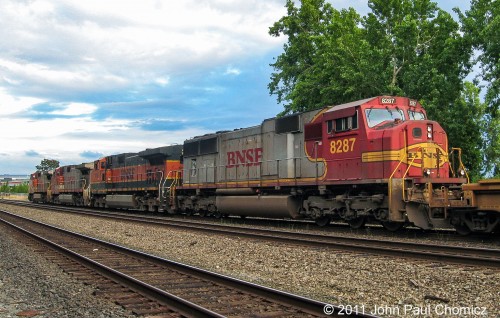 A BNSF intermodal train waits to depart, as it sits near the Puget Sound, in Seattle, WA.