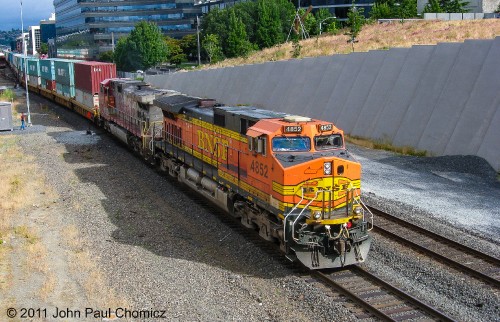 Another warbonnet is the trailing unit on this southbound intermodal train through downtown Seattle, WA.