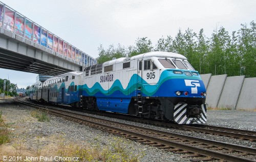 The Seattle Metropolitan Area commuter system, "The Sounder", passes near the, "Olympic Sculpture Park", in Seattle.