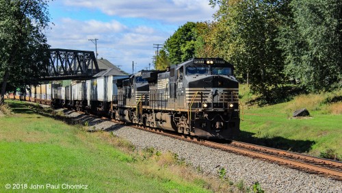 An eastbound NS intermodal train emerges out from under Main Street Bridge, in Phillipsburg, NJ.