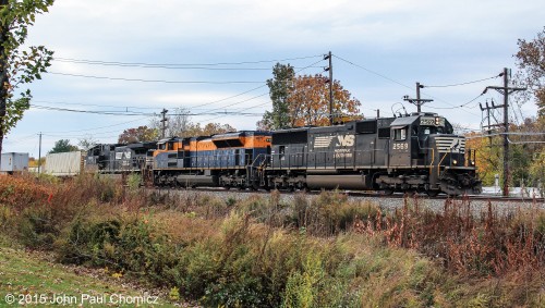 The CNJ unit is in the middle, as it heads east on Train #: 212, in Clark, New Jersey.