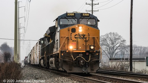 An Oak Island bound CSX Q mixed freight train heads east (north) up the Lehigh Line.