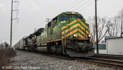 After waiting through a parade of eastbounds and with the lighting getting worse, the Illinois Terminal Unit finally appears leading NS train #: 18N up the Lehigh Line, in Cranford, NJ.