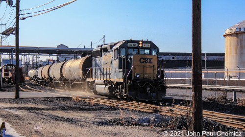 Bayonne local YPBA-27 pulls a string of tank cars out from Gordon Terminal on the southernmost point of the Hook Road in Bayonne, NJ.