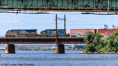 On a beautiful, sunny afternoon, the Oak Island bound Q433 arrives onto the causeway of the Upper Bay Drawbridge.