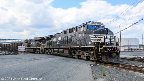 In another pleasant twist, rather than sending the ballast train straight into Bayonne yard, the Conrail crew diverted the train down the Constable Hook Industrial Track, which led to something I have never seen before. Although I am not sure if this has happened in the past, it is the first and only time I've ever seen large six axle power down this track. According to my grandfather, who used to work for Conrail out of Bayonne, these large units were not used down this track as the turns are too tight and the units would risk derailment. So, it was an even nicer surprise to be able to photograph this train as it crossed the Hook Road, heading down towards Chem South.