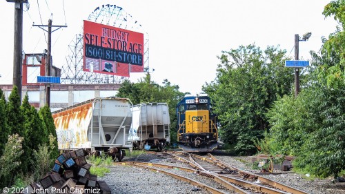 A look to the other side of the crossing reveals the Oak Island local as it pauses to pick up the outbounds from Allied Extruders in the Ironbound Section of Newark, NJ.