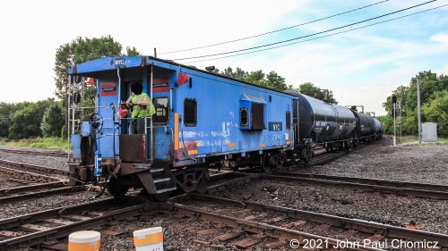 After returning to Marion Yard, the local then crossed over to the Toledo Line and shoved south, over the quad, with ex-NYC caboose #: 21293 in the lead. As always, privacy is a major concern so the friendly conductor has been blacked out.