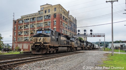 My first real railfanning action of the trip came when I saw the passing of Norfolk Southern westbound, mixed freight train #: 171. Here, it is seen passing the defunct Westinghouse Building just west of downtown Mansfield, OH. This Conway, PA to Chattanooga, TN train has just finished working the yard in Mansfield and is crossing East 5th Street on the old Pennsy Fort Wayne Line.