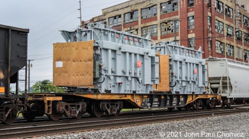 Two cars away from the locos, on train #: 171, was this eight axle flat car with two Siemens Transformers all the way from Austria. Curiously, the transformers were unwrapped and left exposed to the elements.