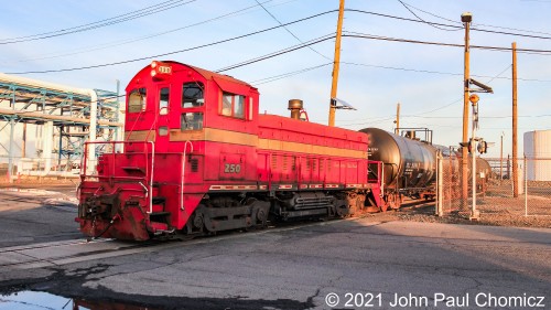 A closer look at this engine shows that it is titled, "The Red Baron". After pulling out tank cars, it shoves back into Yard #: 8 to gather the remaining cars in the yard.