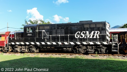 The Great Smoky Mountains Railroad GP9 #: 711 sits in the yard after a long day of pulling excursion trains in Bryson City, NC. Photo taken in 2017.