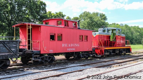 The Reading Caboose #: 92936 is on the end of what would be the excursion train of that day. The Wanamaker, Kempton, and Southern Railroad centercab #: 734 is about to pull the train off the siding and back it into the station to pick up passengers. Photo taken in 2016.