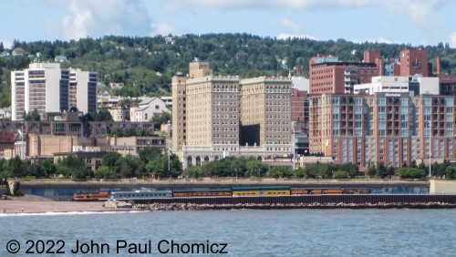 The North Shore Scenic Railroad excursion train, led by Great Northern #: 192, passes the Duluth skyline as it returns back to Duluth Depot. Photo taken in 2012.