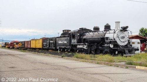 Sitting on the sidelines in Antonito, today, is the #: 495 along with a bunch of vintage freight cars and other assorted railroad equipment.