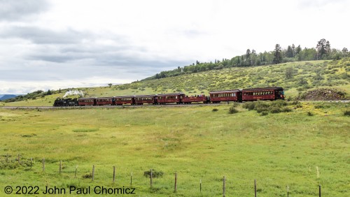 The Chama Limited has just crossed over Route #: 17 and is now on the west side of the road. From here on, it will stay on this side of the road until it reaches Chama.