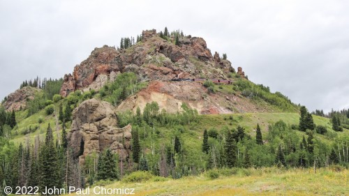 Looking like a scene from the Runaway Mine Train ride in Disney World, the Chama Limited rides high up on the mountain side shortly after departing the Cumbres Pass Station in Colorado.