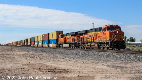 A westbound doublestack train passes through the Belen suburb of Rio Grande Estates near Belen, NM.