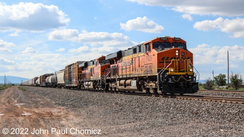 An eastbound mixed freight passes through the poor little town of Willard, NM.