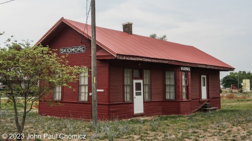 The roadside view of the Skidmore CB&Q Railroad in Skidmore, MO. The station served passengers until 1955 and now is in the process of being converted into a museum. Hopefully, this will be a positive addition to this city that has developed a reputation for being a city that got away with murder, as well as some other unfortunate occurrences. Still, whether or not this city deserves that reputation, it's more of a byproduct of a justice system that failed them rather than a reflection of the inhabitants, themselves.