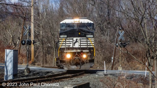 I have numerous outtakes from past trips that I never posted for one reason or another, however, as time passes and the units are no longer in service or if railroad activity dries up in certain areas, I feel more inclined to post them. Here, two NS units cross River Road in Portland, PA after interchanging with the D&L up the road in Slateford. Picture taken in 2014.