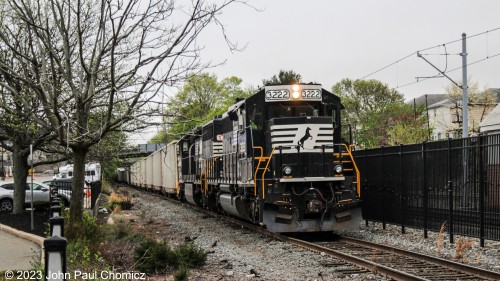 After doubling up its train, the storm is closer, and the sky is darker as YPBA-50 has all the outbounds and is heading north to Oak Island. I was surprised to catch the outbound on a Saturday afternoon as it usually appears late on Sunday night and returns early Monday morning. In this case, the local would arrive with the inbounds about five hours later at 10PM.