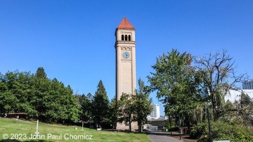 The clock tower is the only thing that remains of the Great Northern Depot in Spokane, WA. The depot was built in 1902, on Havermale Island, and was used up until the 60's when passenger traffic dried up. In the 70's, the depot was demolished to make way for the Expo of 1974 and all that was kept was the clocktower. The clock tower faces are all 9' across, making it the largest clock in the western US.